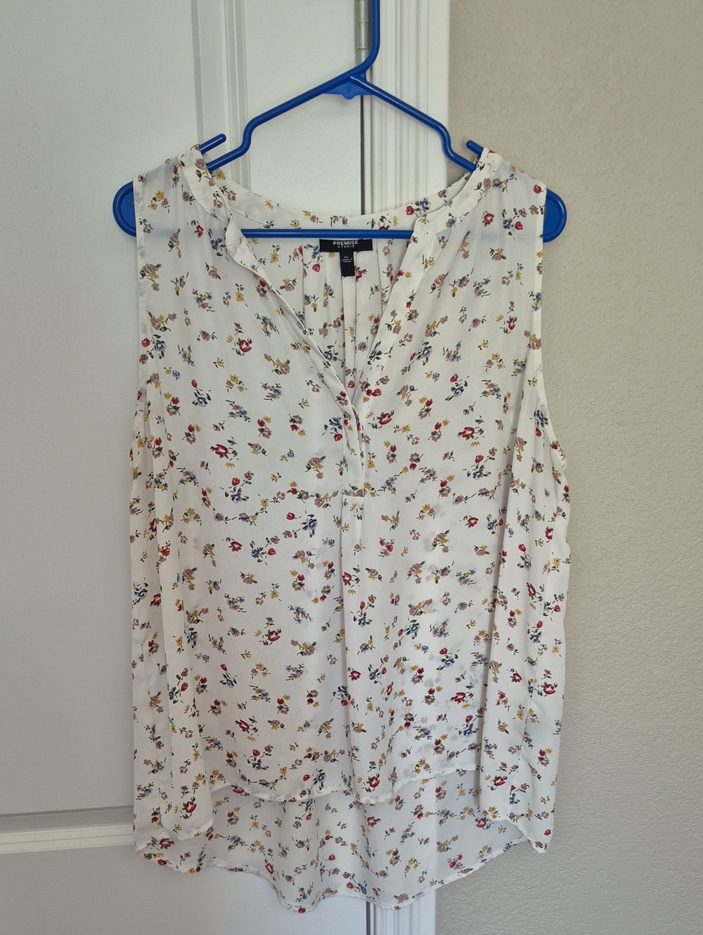 White Floral Sleeveless V-Neck Sleeveless Blouse with Red & Yellow Accents
